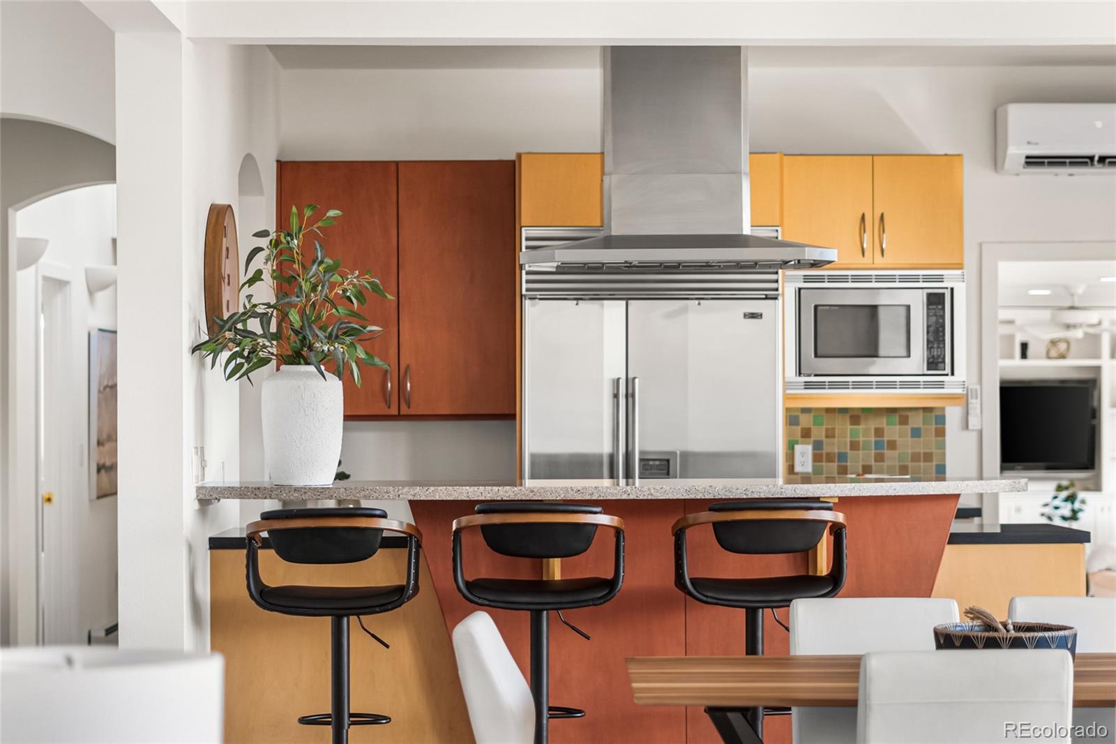 700 Utica Avenue Boulder, CO 80304 - Photo 13 of 50 a kitchen with stainless steel appliances a sink and a table