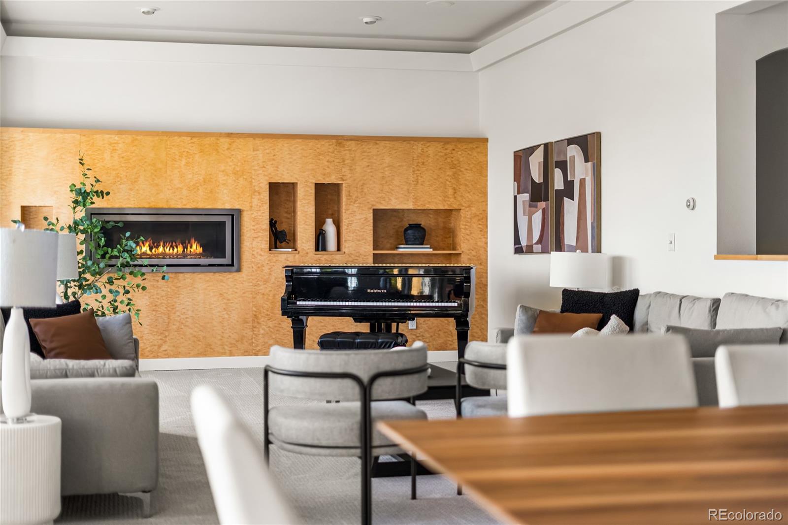 700 Utica Avenue Boulder, CO 80304 - Photo 18 of 50 a living room with furniture a flat screen tv and a floor to ceiling window