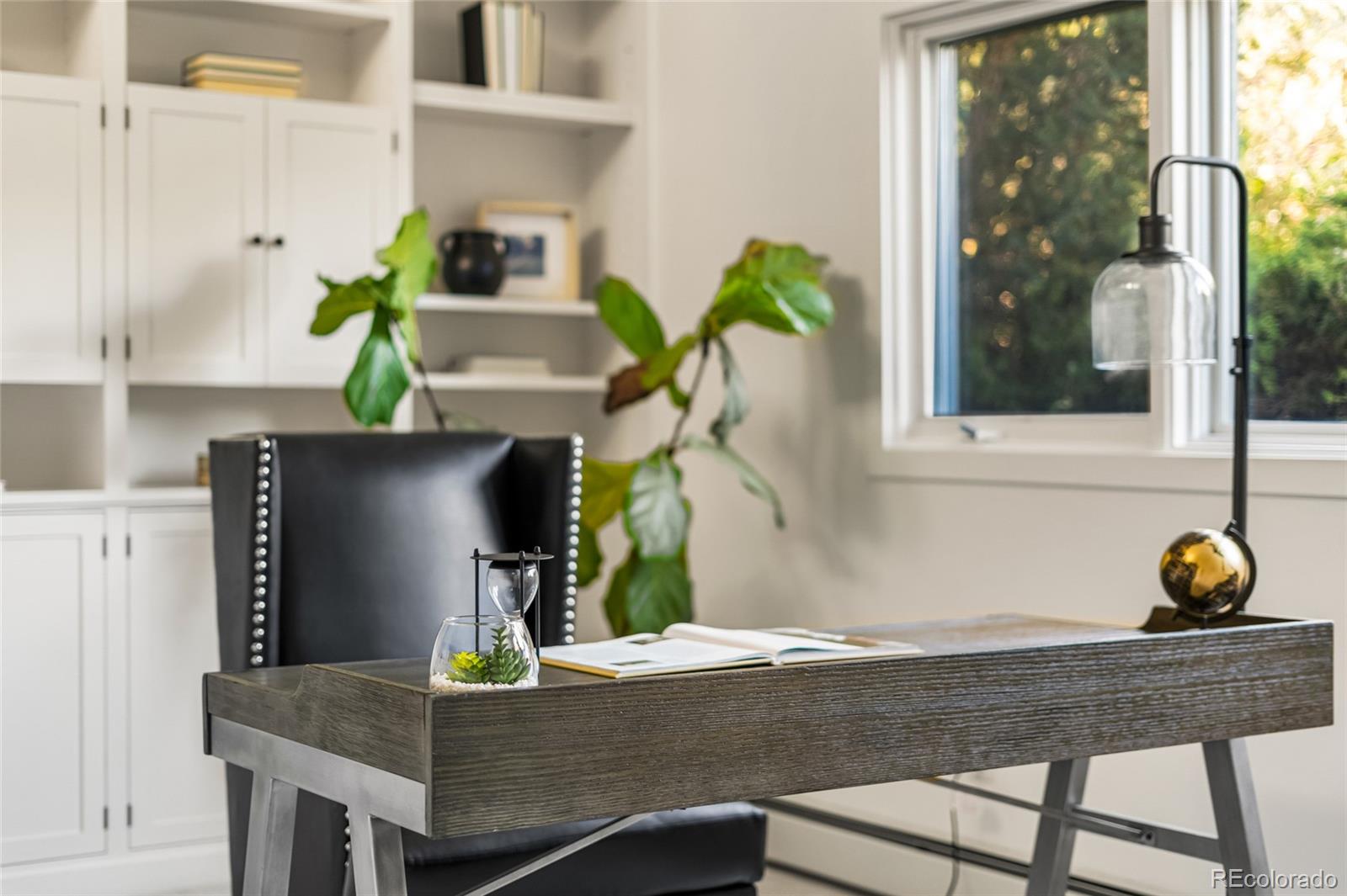 700 Utica Avenue Boulder, CO 80304 - Photo 19 of 50 a living room with furniture and potted plant