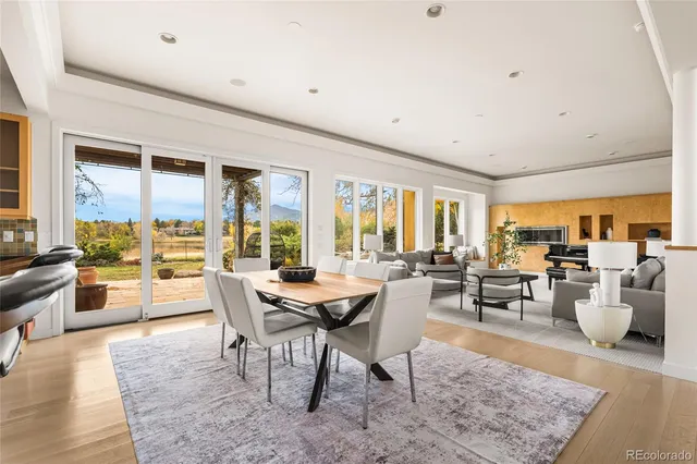 a bedroom with furniture and a wooden floor
