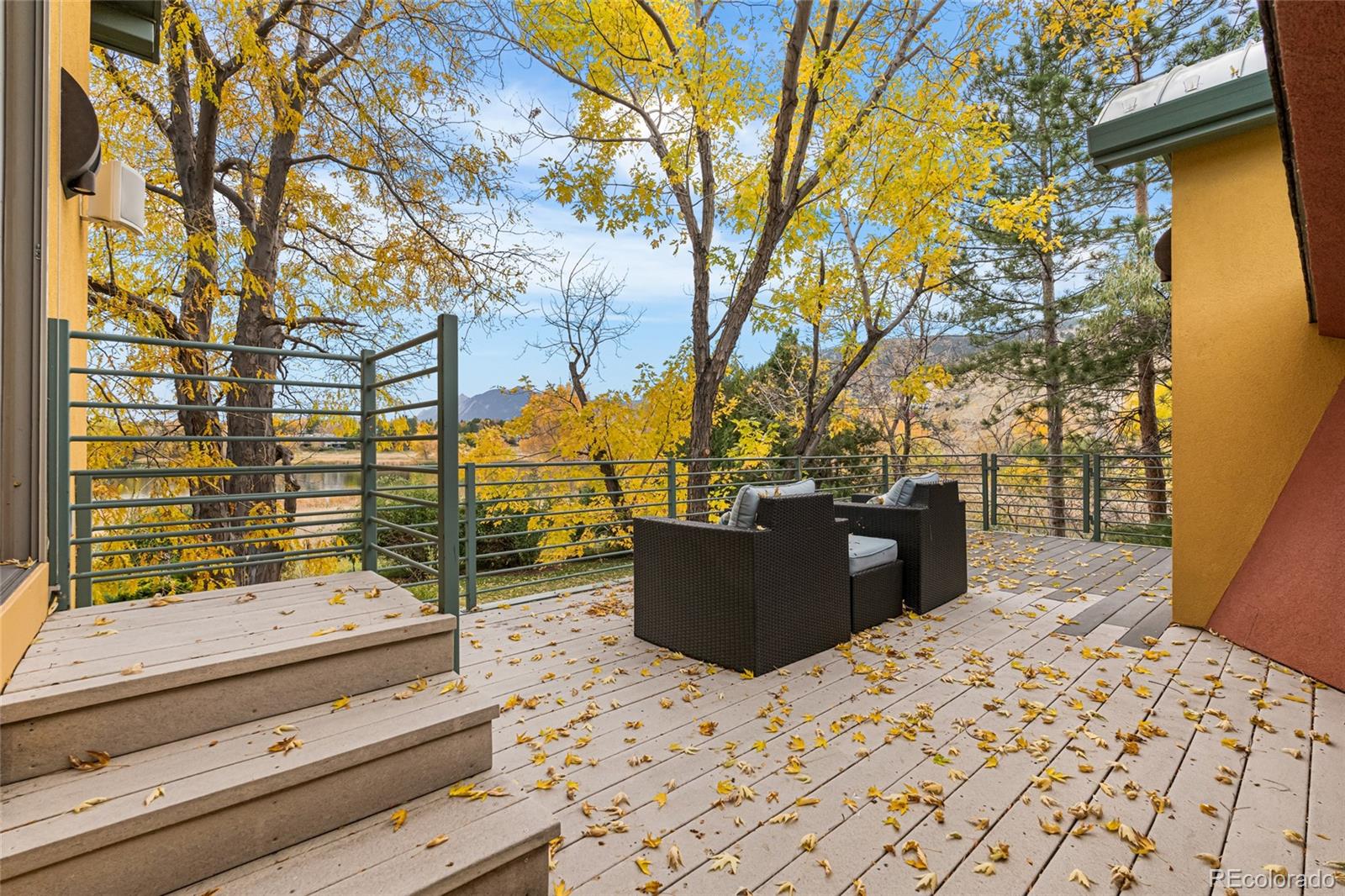 700 Utica Avenue Boulder, CO 80304 - Photo 43 of 50 a view of roof deck with wooden fence and floor