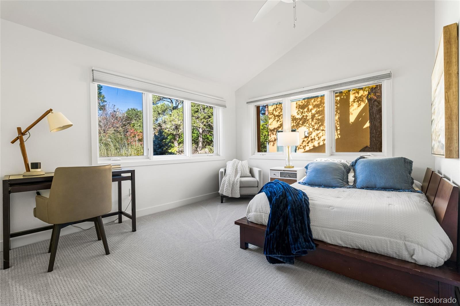 700 Utica Avenue Boulder, CO 80304 - Photo 45 of 50 a bedroom with a bed and a couch