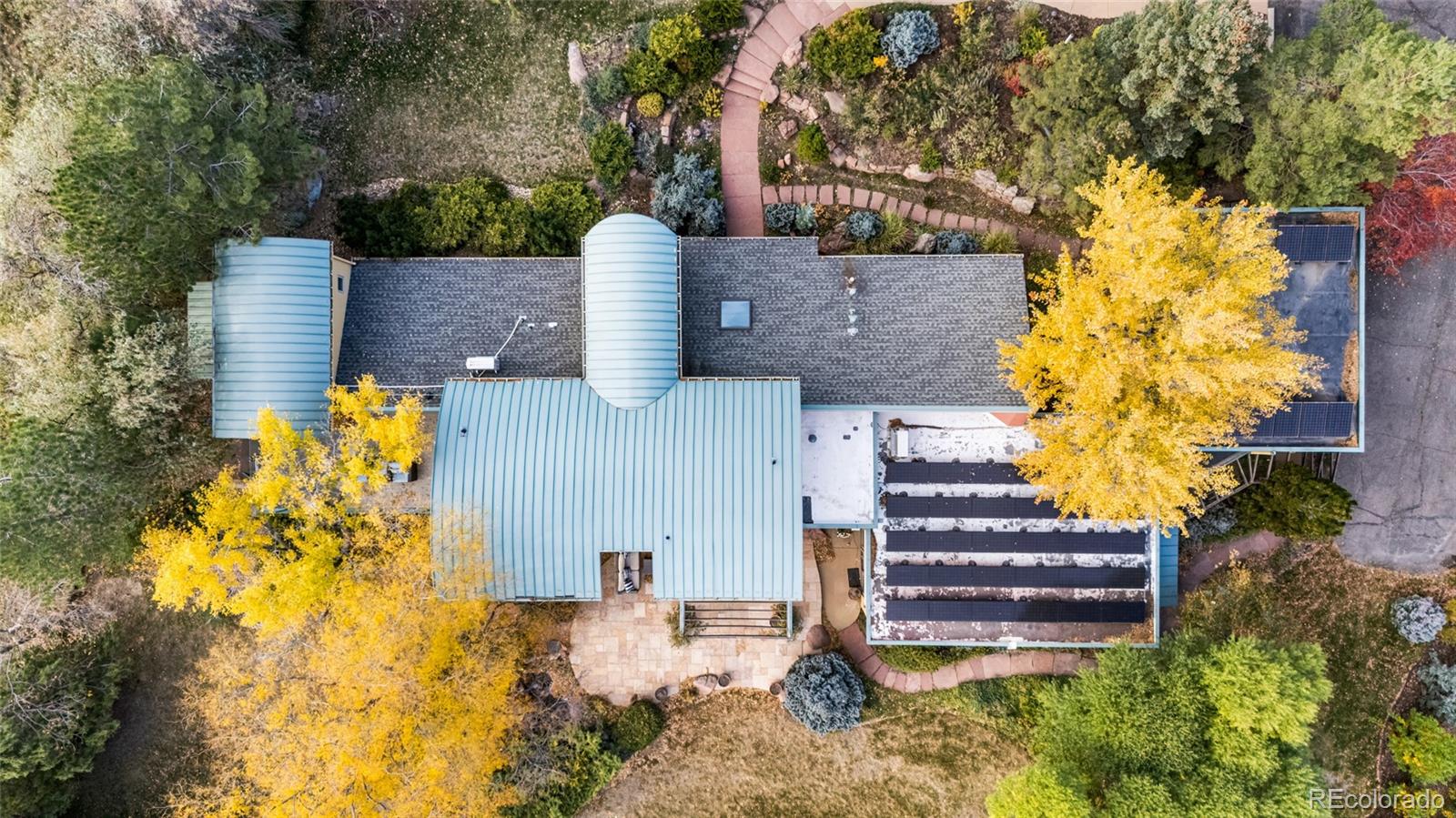 700 Utica Avenue Boulder, CO 80304 - Photo 7 of 50 a view of a house with a yard and sitting area
