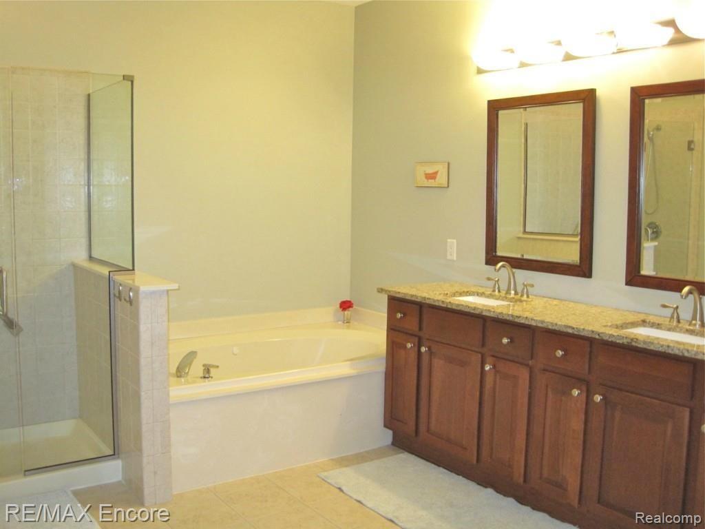 3687 Tremonte Circle, Unit 73 Rochester, MI 48306 - Photo 22 of 43 Updated Master Bathroom