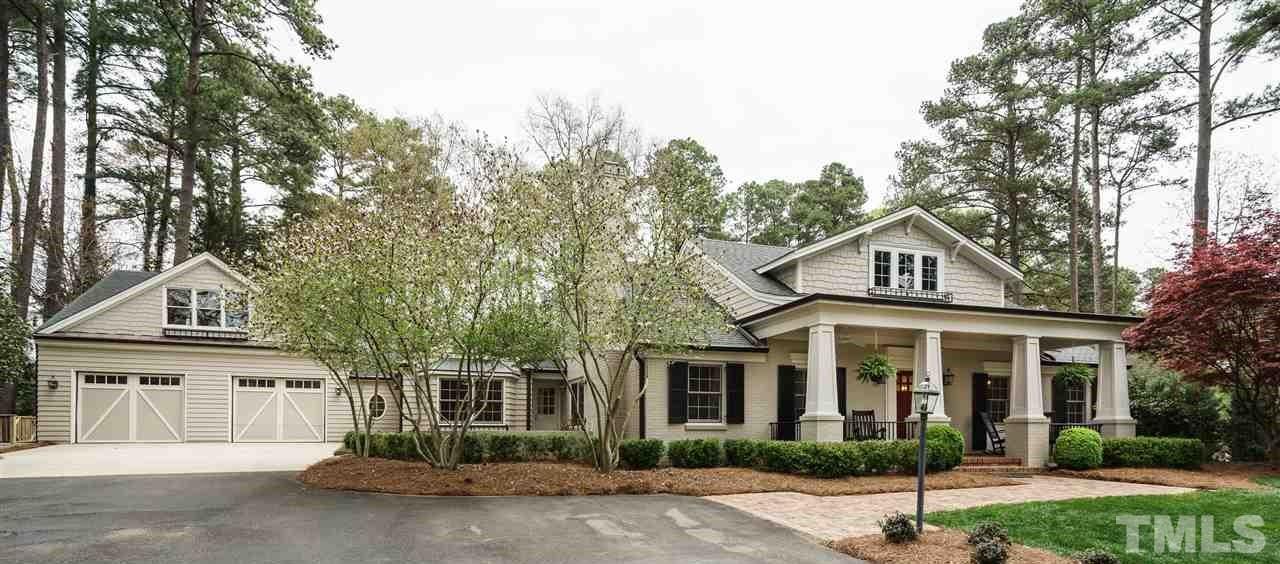 3202 Birnamwood Road Raleigh, NC 27607 - Photo 2 of 25 front view of a house with a yard