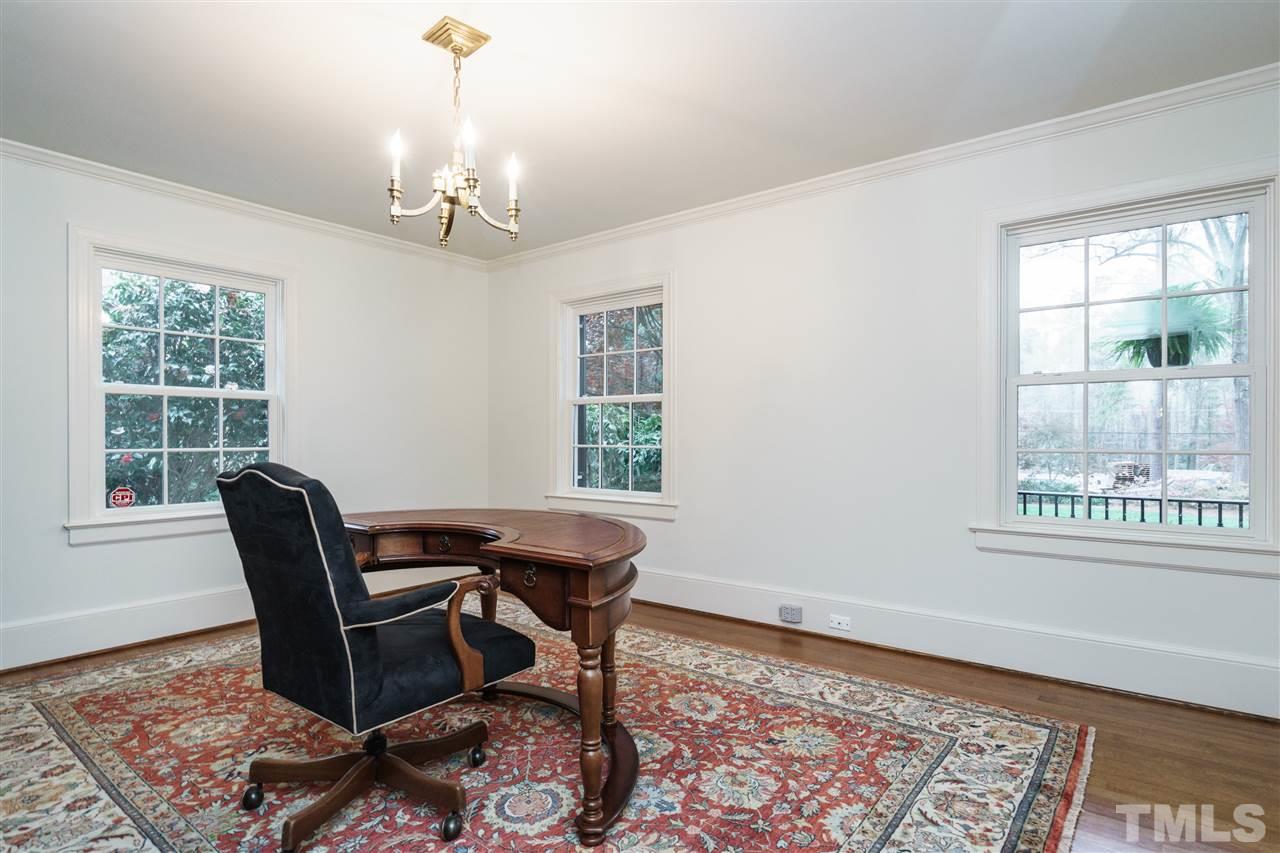 3202 Birnamwood Road Raleigh, NC 27607 - Photo 12 of 25 a workspace with wooden floor