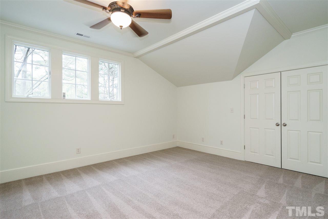 3202 Birnamwood Road Raleigh, NC 27607 - Photo 18 of 25 a view of an empty room with a window