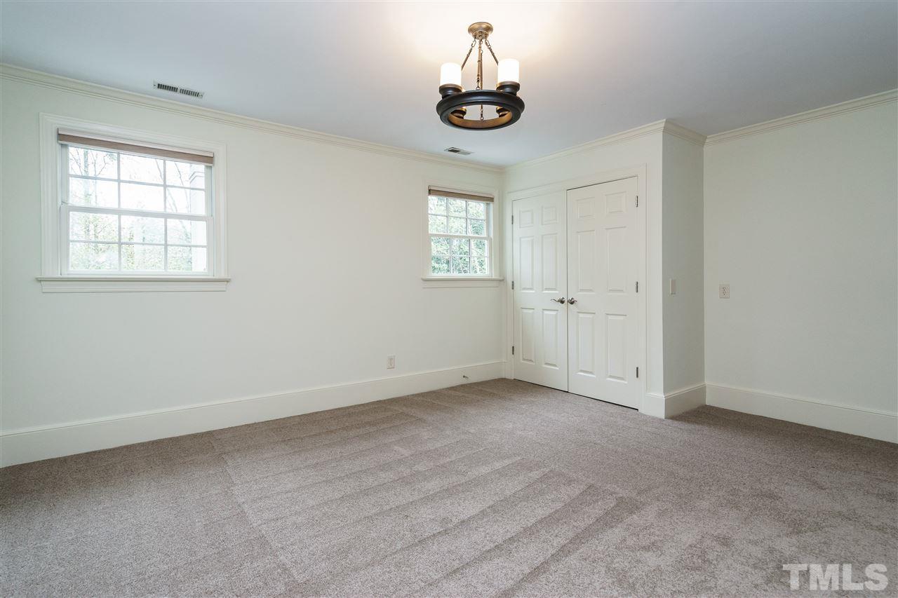 3202 Birnamwood Road Raleigh, NC 27607 - Photo 20 of 25 a view of an empty room with a window