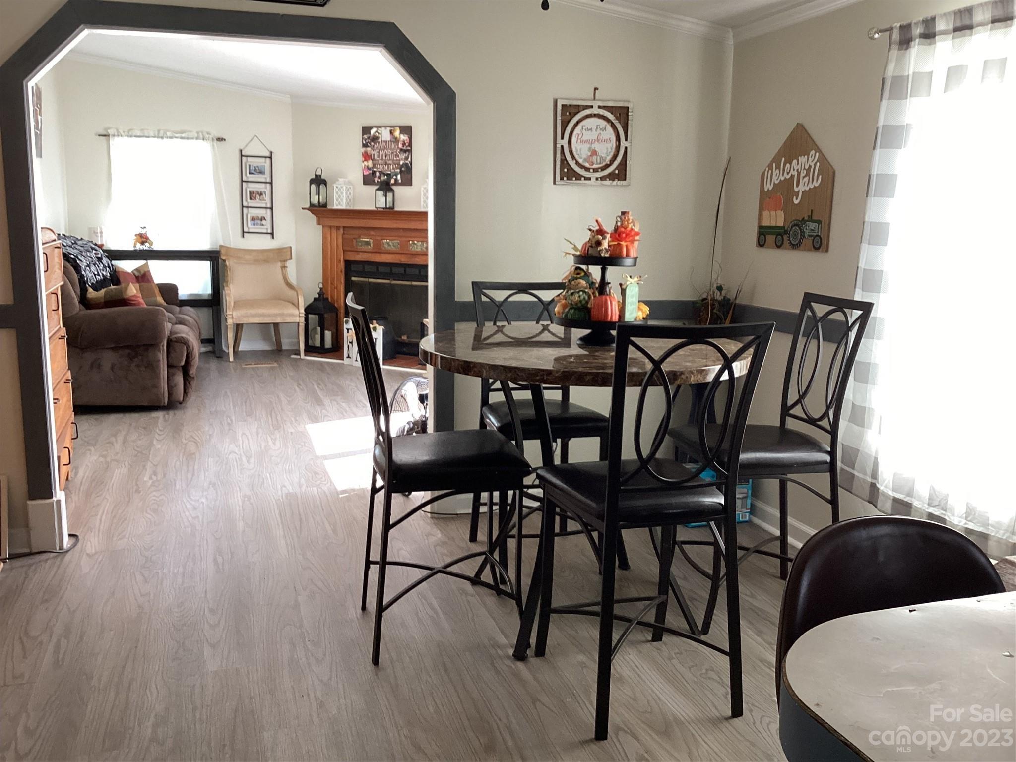 3535 Plateau Road Vale, NC 28168 - Photo 23 of 36 a view of a dining room with furniture and wooden floor