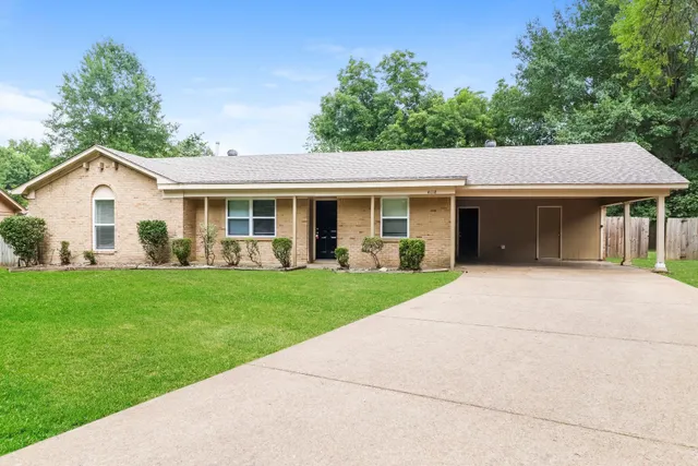 a view of outdoor space yard and front view of a house