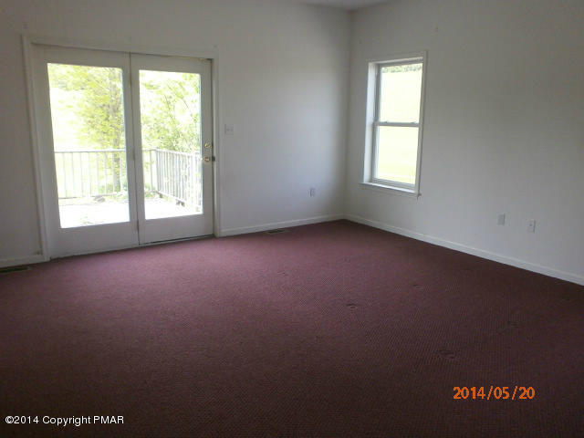 2201 Storm Road Stroudsburg, PA 18360 - Photo 7 of 12 an empty room with a window