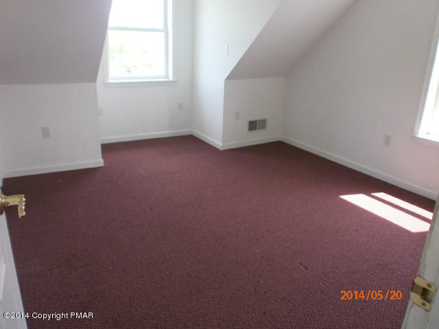 2201 Storm Road Stroudsburg, PA 18360 - Photo 8 of 12 an empty room with a window