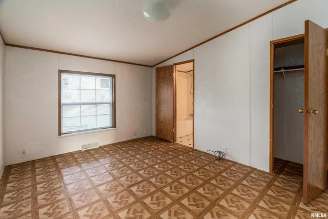a view of a storage & utility room with a sink