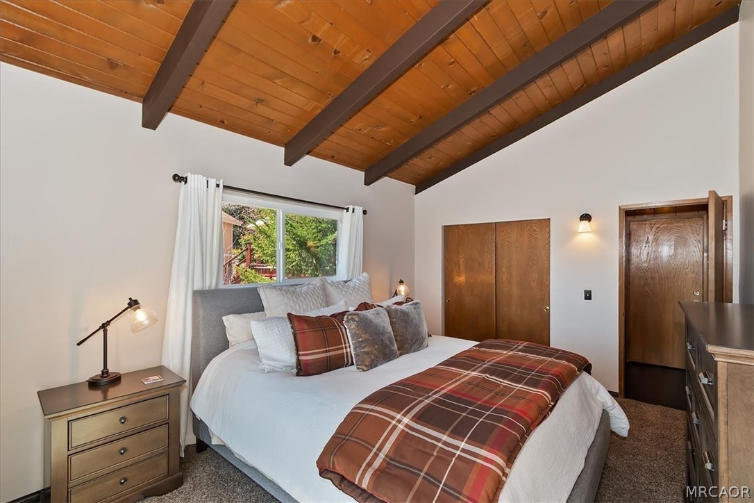 27994 West Shore Road Lake Arrowhead, CA 92352 - Photo 16 of 30 a bedroom with bed and a window