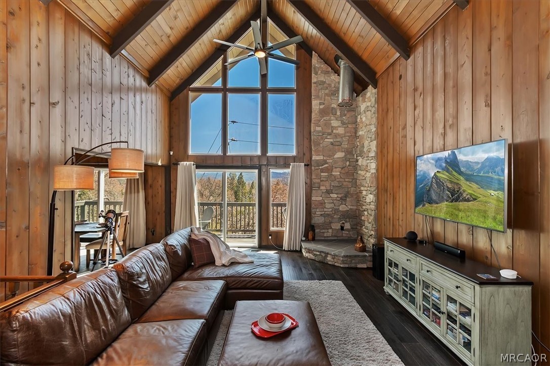 27994 West Shore Road Lake Arrowhead, CA 92352 - Photo 5 of 30 a living room with furniture a flat screen tv and a window