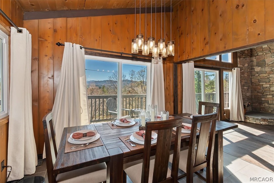 27994 West Shore Road Lake Arrowhead, CA 92352 - Photo 10 of 30 a view of a dining room with furniture window and outside view