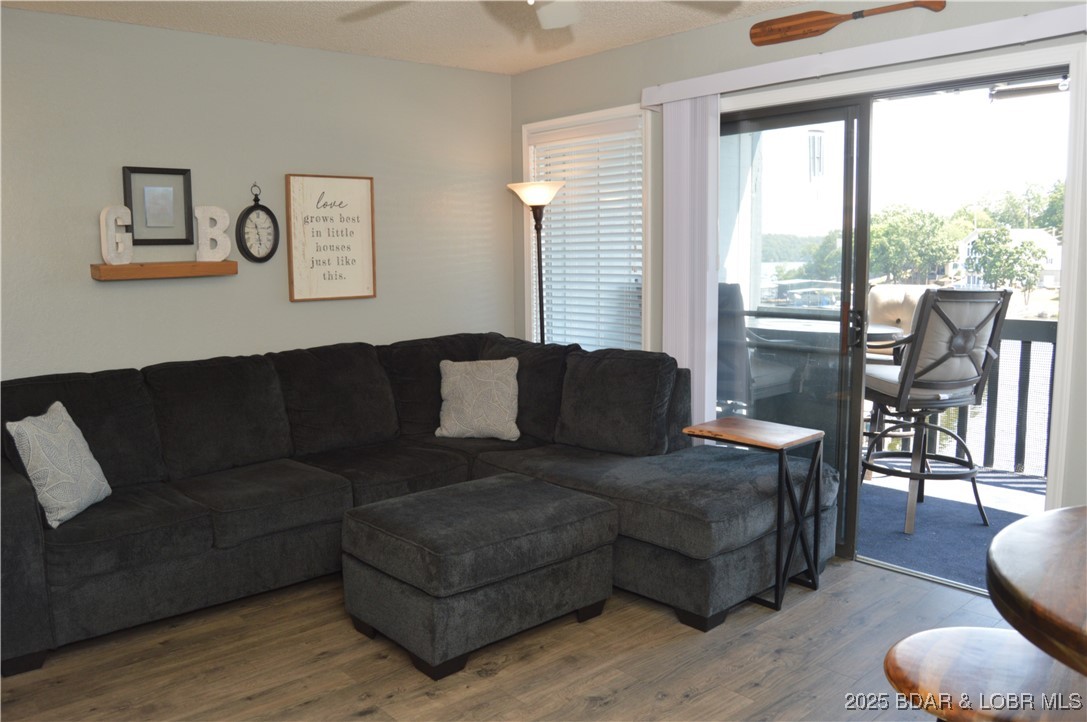 1442 Nichols Road, Unit B304 Osage Beach, MO 65065 - Photo 14 of 31 Living Room/Deck