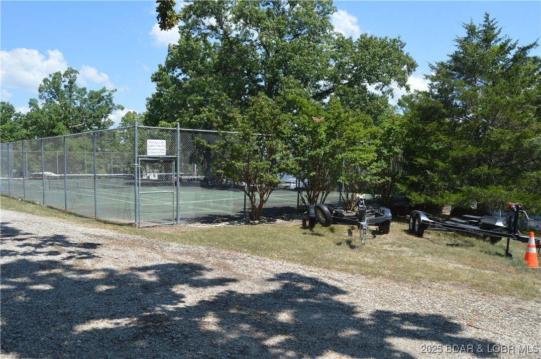 1442 Nichols Road, Unit B304 Osage Beach, MO 65065 - Photo 28 of 31 Tennis court and extra boat storage parking