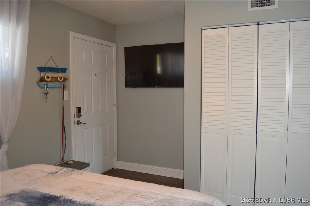 1442 Nichols Road, Unit B304 Osage Beach, MO 65065 - Photo 9 of 31 Entrance/TV/Closet space
