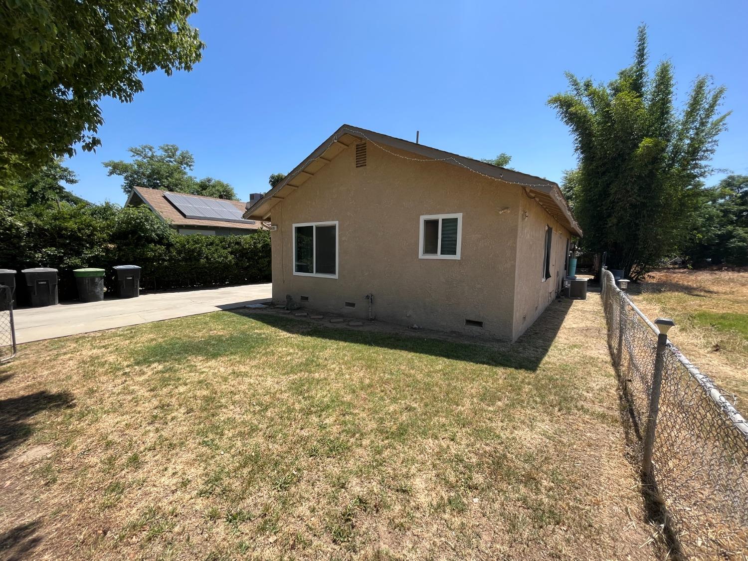 5433 Wildwood Del Rey, CA 93616 - Photo 17 of 17 a house view with a backyard space