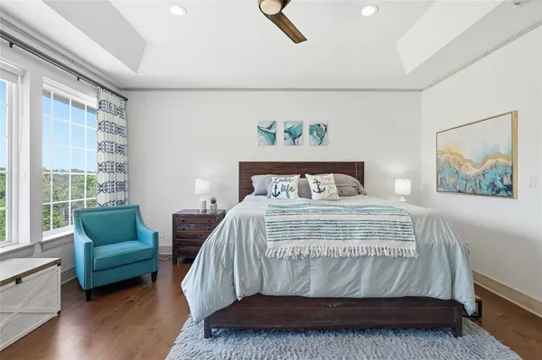 a bedroom with a bed and a couch