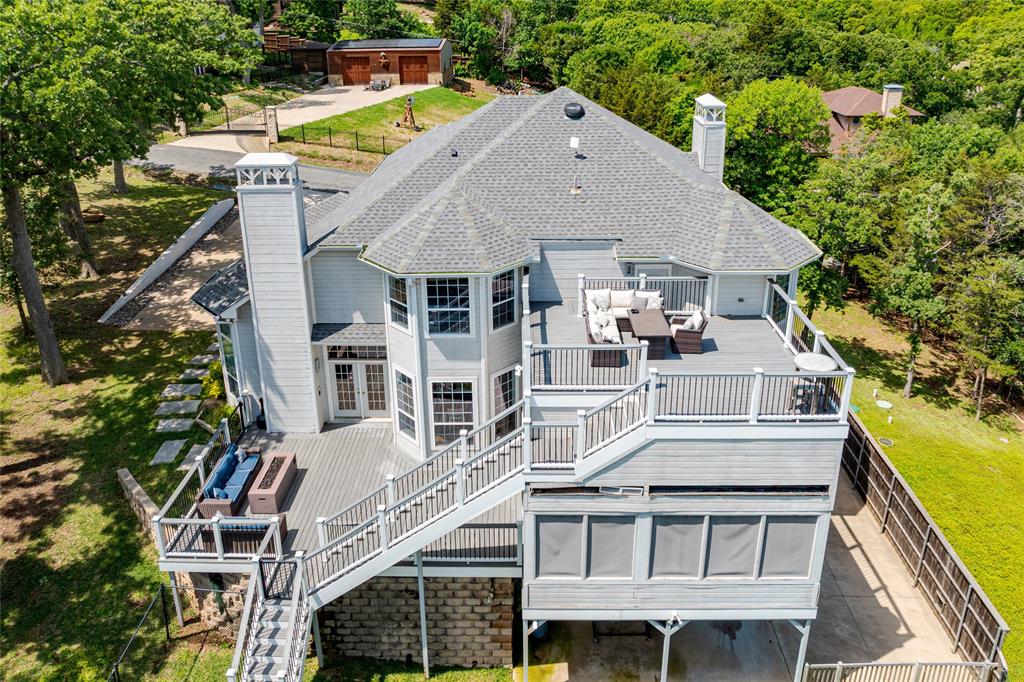 606 Lake Point Loop Pottsboro, TX 75076 - Photo 6 of 40 a aerial view of a house with a yard