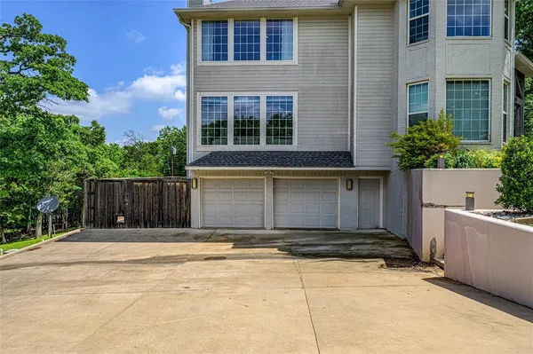 a front view of a house with a garage