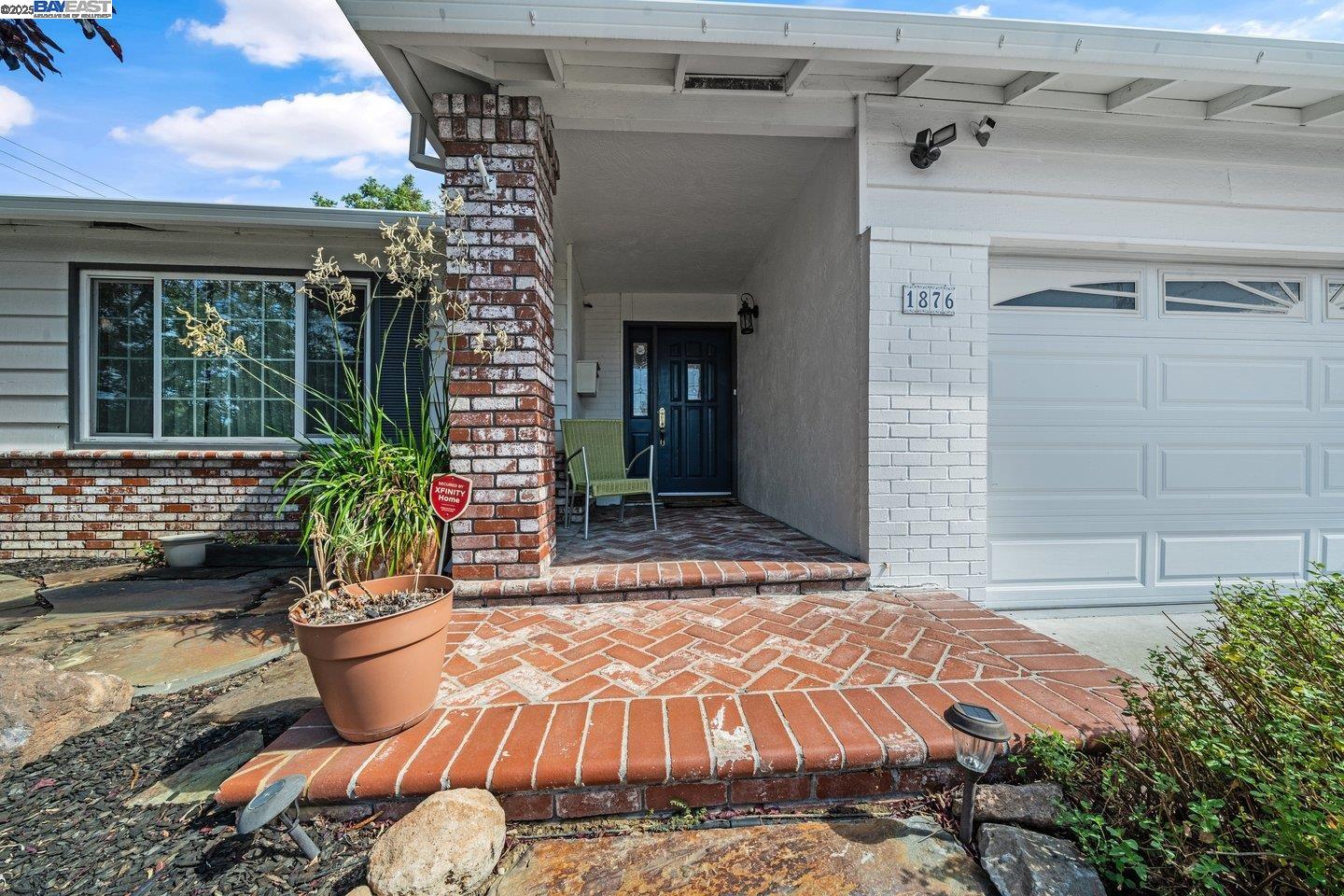 1876 Lynwood Drive Concord, CA 94519 - Photo 1 of 39 a view of a balcony with chair and potted plants