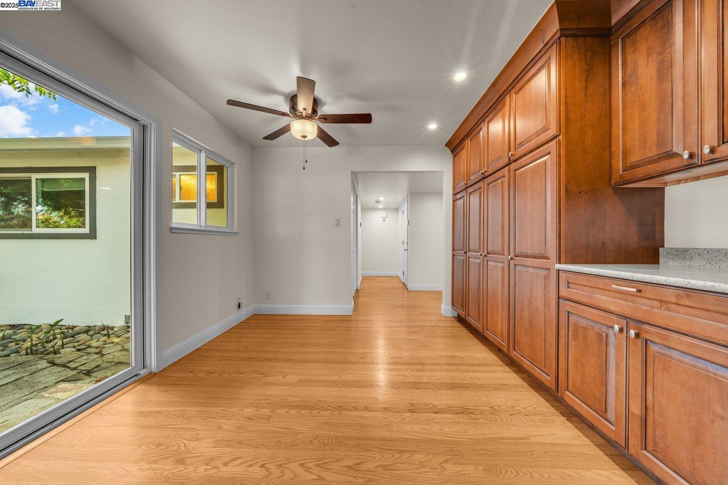 1876 Lynwood Drive Concord, CA 94519 - Photo 14 of 39 a view of a hallway with wooden floor and staircase