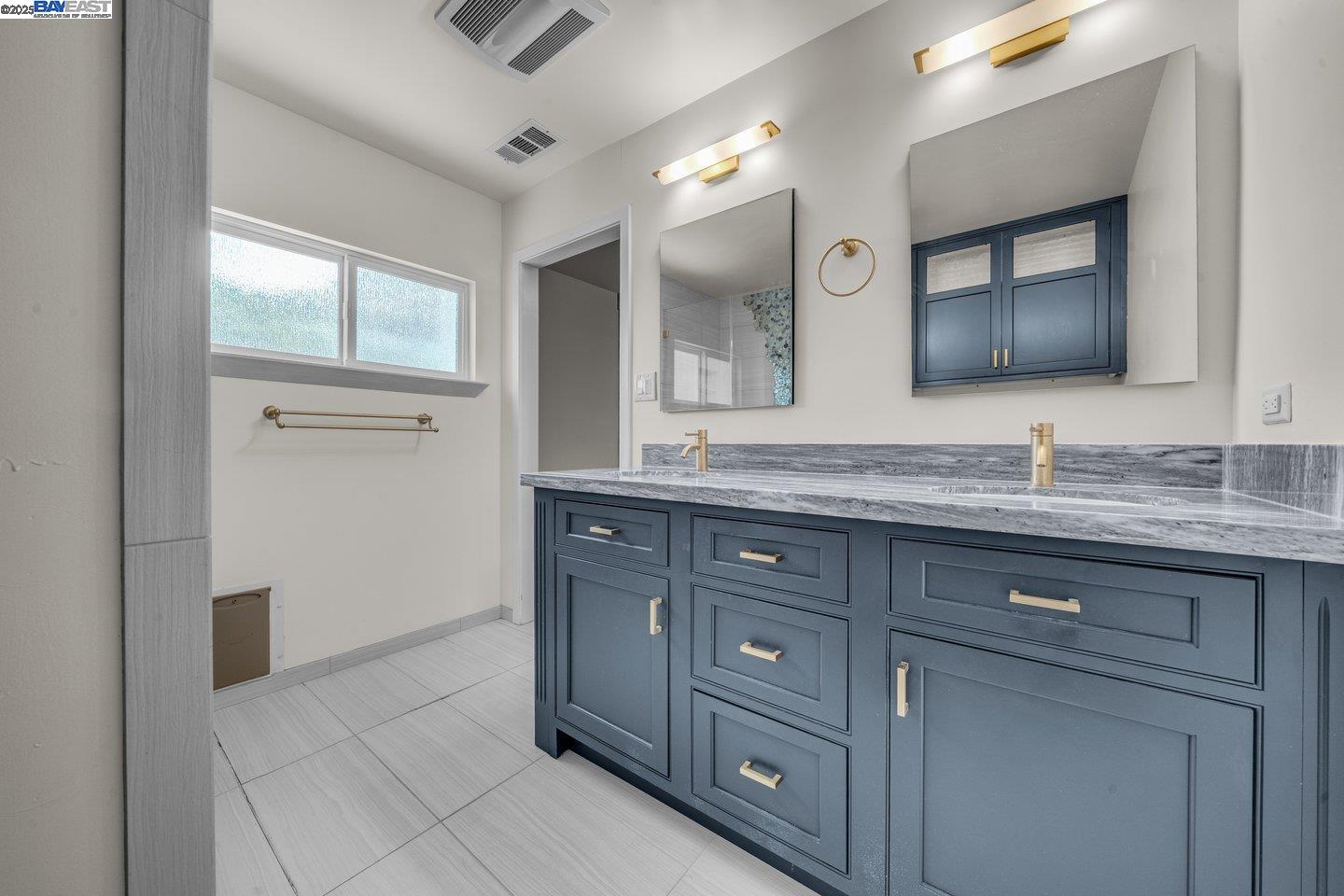 1876 Lynwood Drive Concord, CA 94519 - Photo 18 of 39 a bathroom with a granite countertop sink mirror and