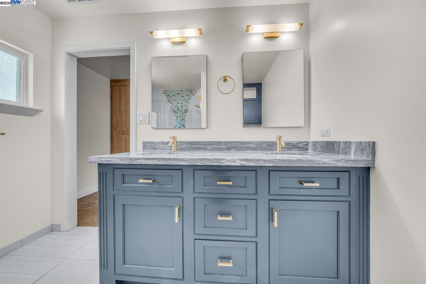 1876 Lynwood Drive Concord, CA 94519 - Photo 21 of 39 a bathroom with a granite countertop sink and a mirror