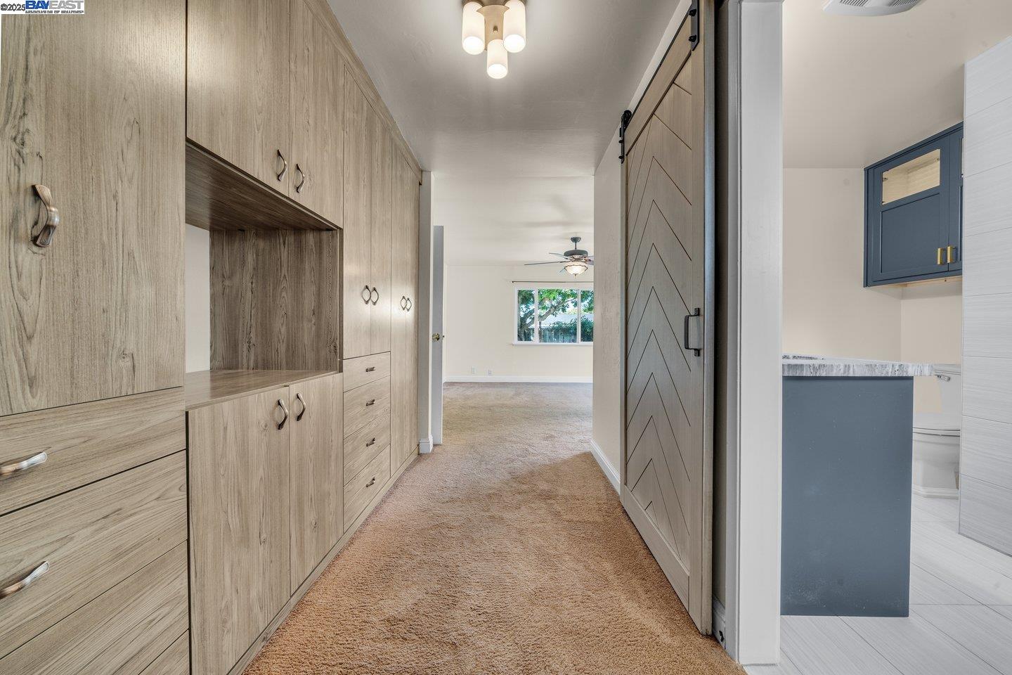 1876 Lynwood Drive Concord, CA 94519 - Photo 23 of 39 a view of a hallway with wooden floor and staircase