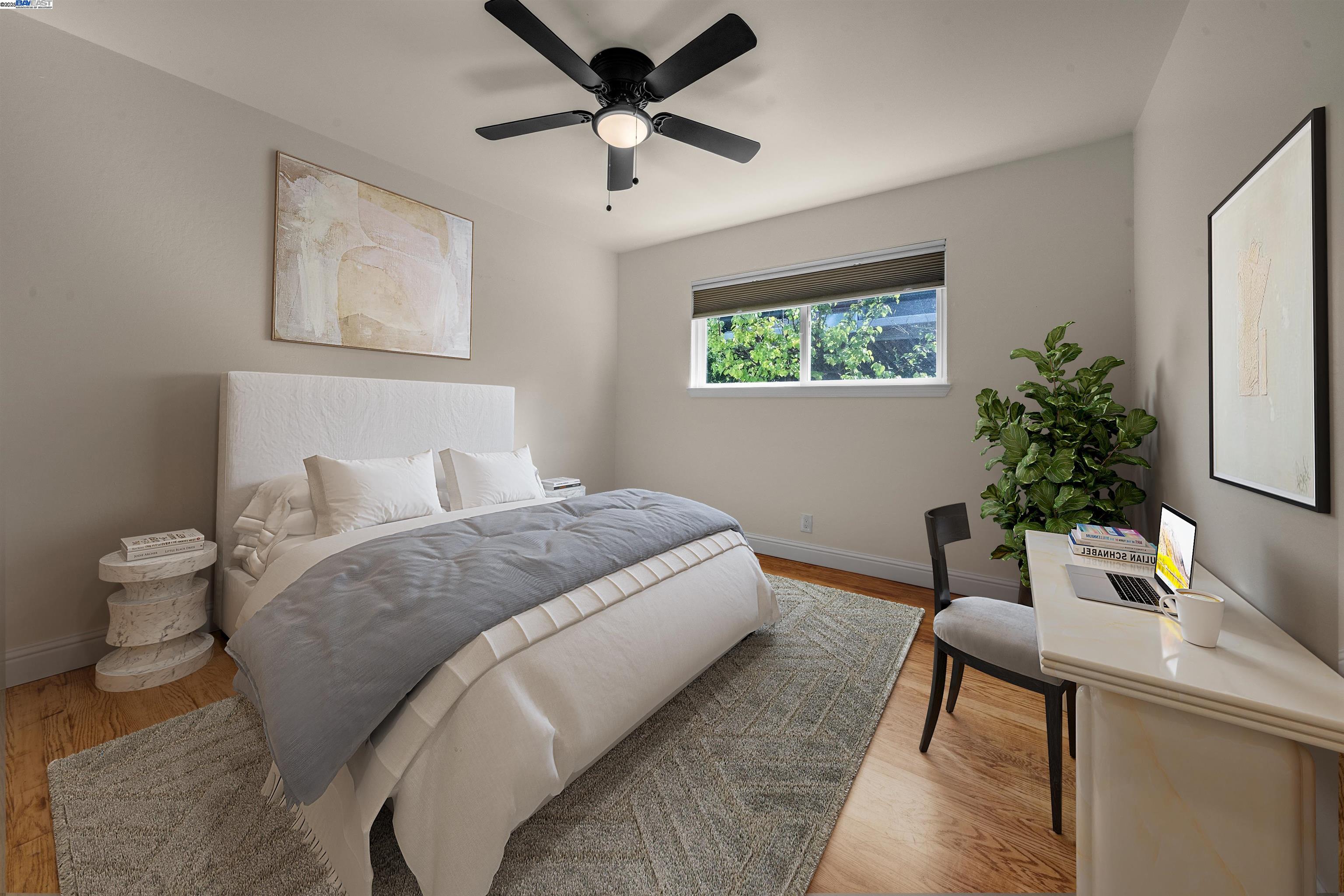 1876 Lynwood Drive Concord, CA 94519 - Photo 26 of 39 a bedroom with a bed and a potted plant