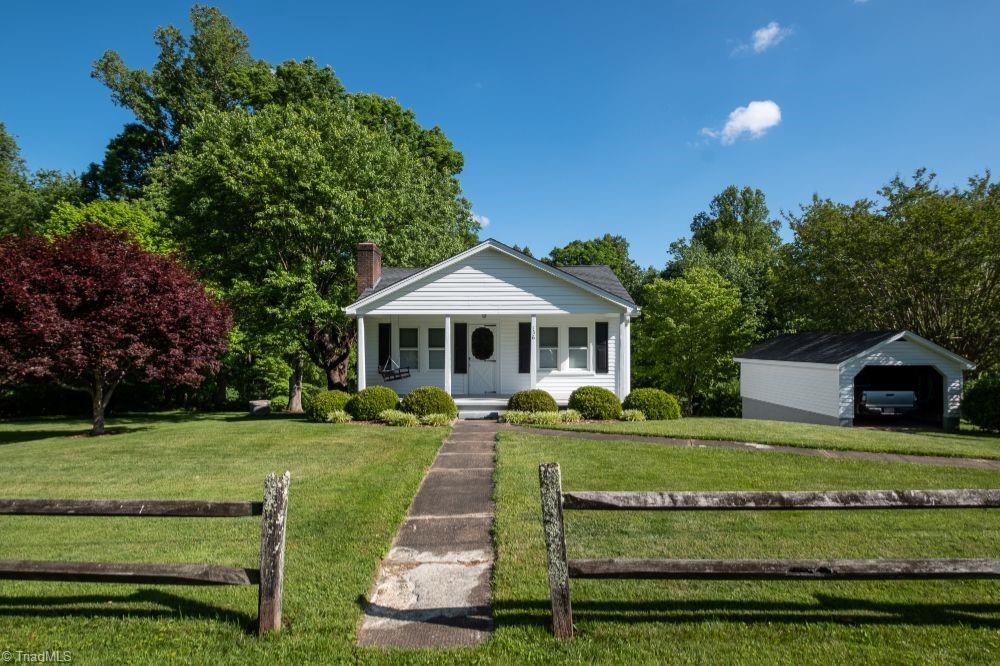 136 Mill Road State Road, NC 28676 - Photo 2 of 25 Property features detached garage.