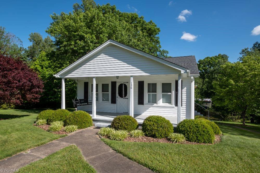 136 Mill Road State Road, NC 28676 - Photo 4 of 25 Home features new siding and windows.