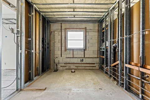 a view of a room with racks on the wall