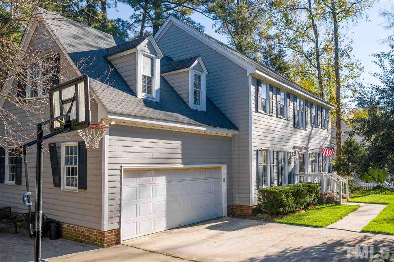 1301 October Road Raleigh, NC 27614 - Photo 3 of 30 a view of a house with a yard