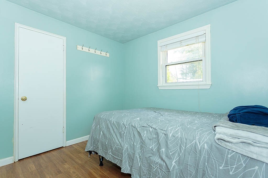 38 McDevitt Road Randolph, MA 02368 - Photo 17 of 22 a bedroom with a bed and a window