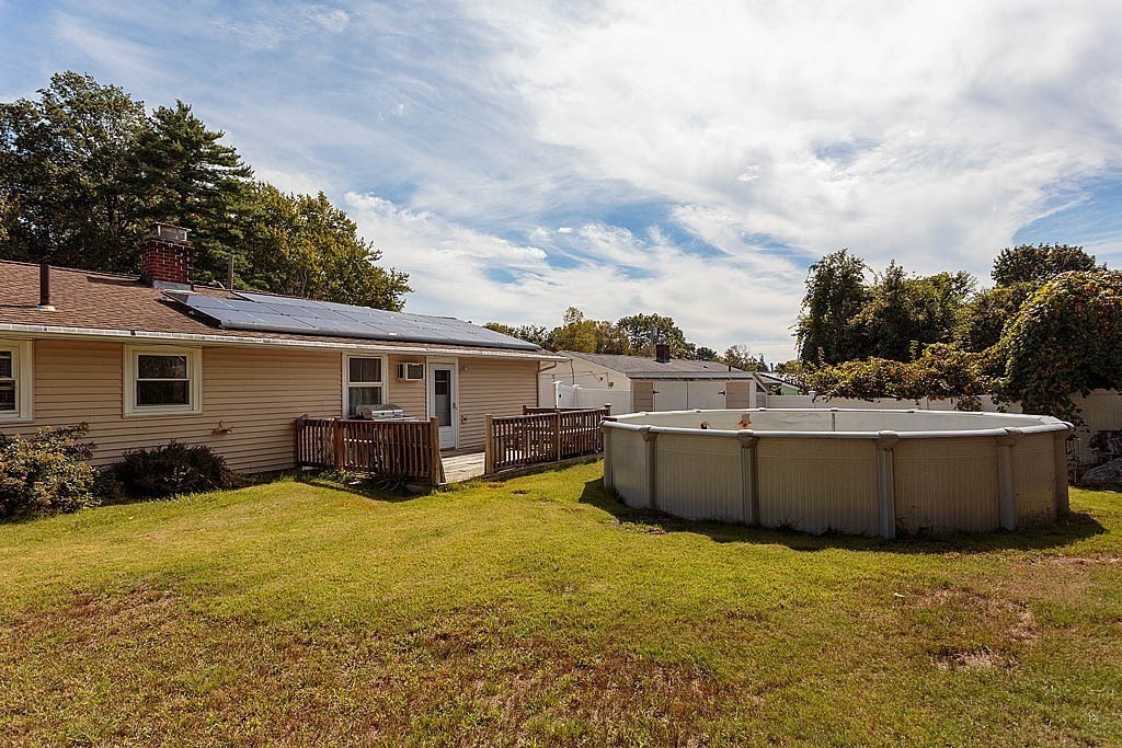 38 McDevitt Road Randolph, MA 02368 - Photo 18 of 22 a view of a house with couches yard and swimming pool