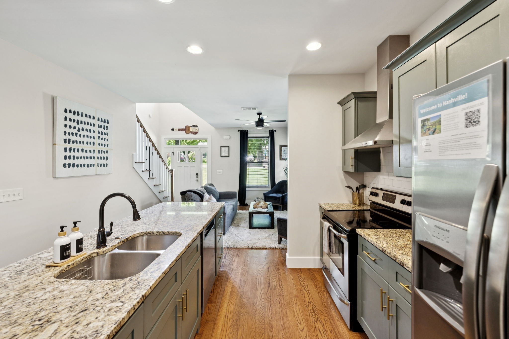 914 Blue Ridge Drive Nashville, TN 37207 - Photo 11 of 33 a kitchen with stainless steel appliances granite countertop a sink stove and refrigerator
