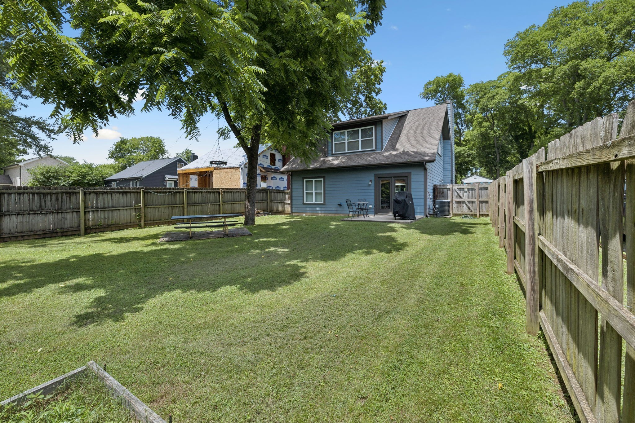 914 Blue Ridge Drive Nashville, TN 37207 - Photo 32 of 33 a view of a house with backyard and a tree