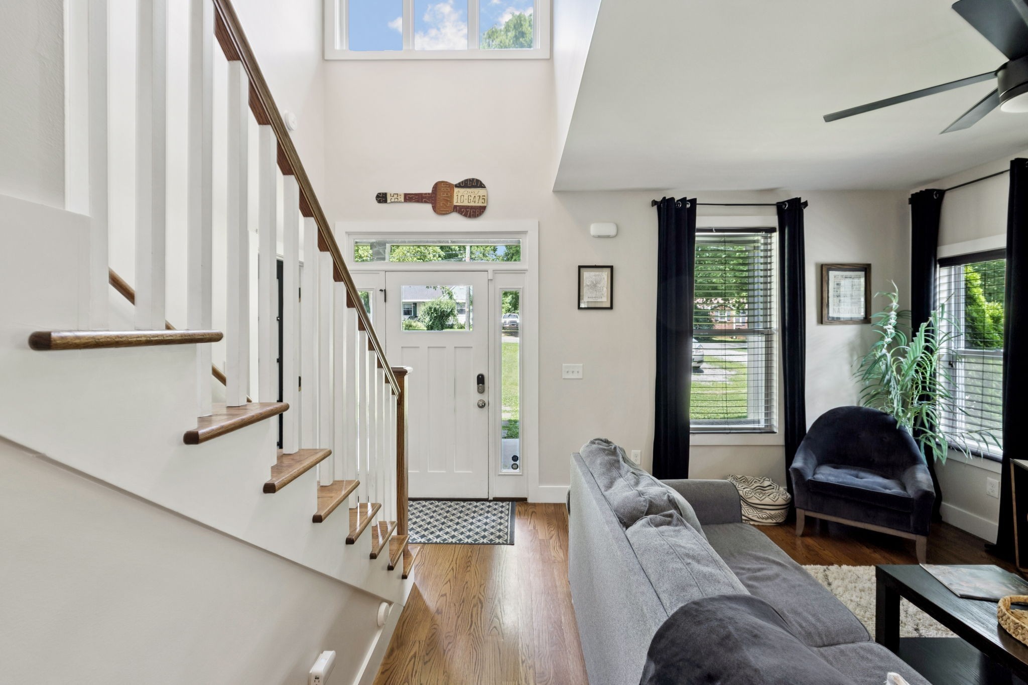 914 Blue Ridge Drive Nashville, TN 37207 - Photo 7 of 33 a living room with furniture and floor to ceiling windows