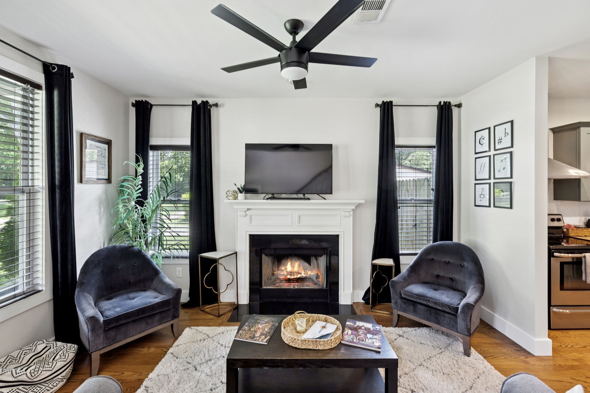 914 Blue Ridge Drive Nashville, TN 37207 - Photo 9 of 33 a living room with furniture a rug and a fireplace