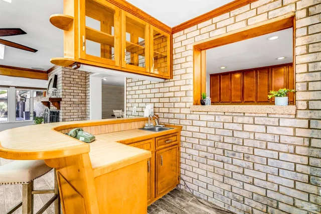 a view of entryway with stairs and wooden floor