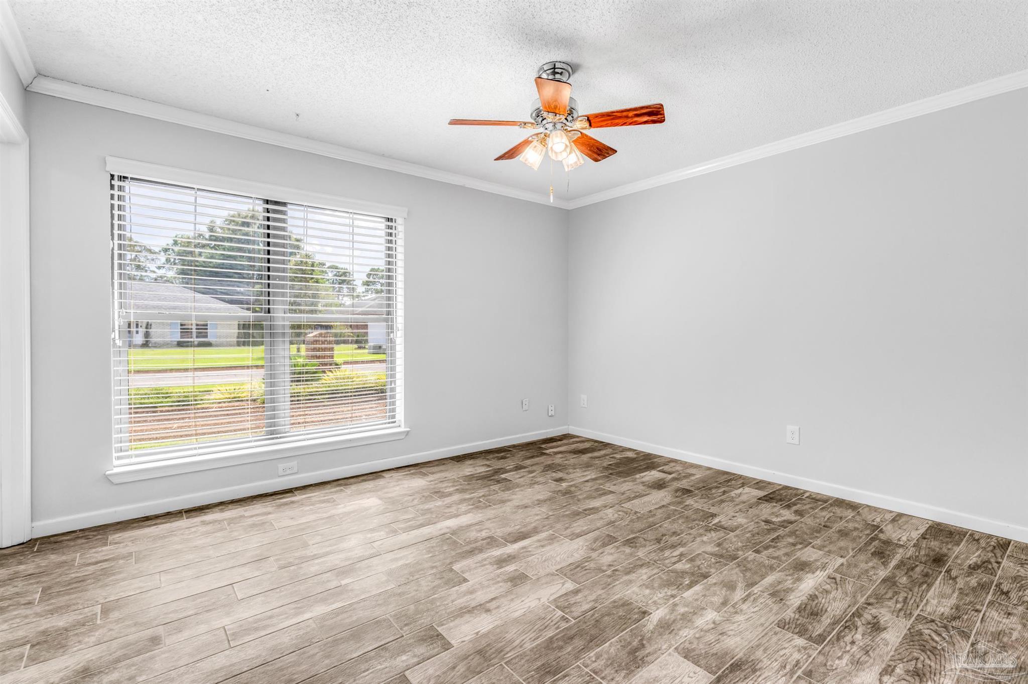 6912 Kitty Hawk Drive Pensacola, FL 32506 - Photo 47 of 61 an empty room with a window