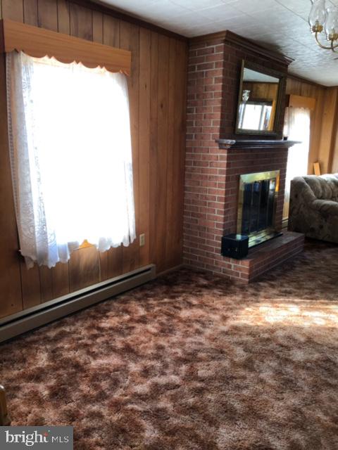 117 East 4th Avenue Ranson, WV 25438 - Photo 48 of 70 Family room with wood burning fireplace