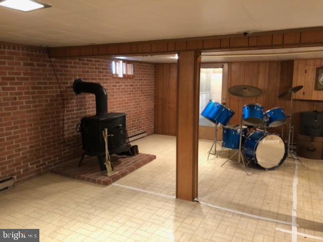 117 East 4th Avenue Ranson, WV 25438 - Photo 57 of 70 Finished basement with woodstove