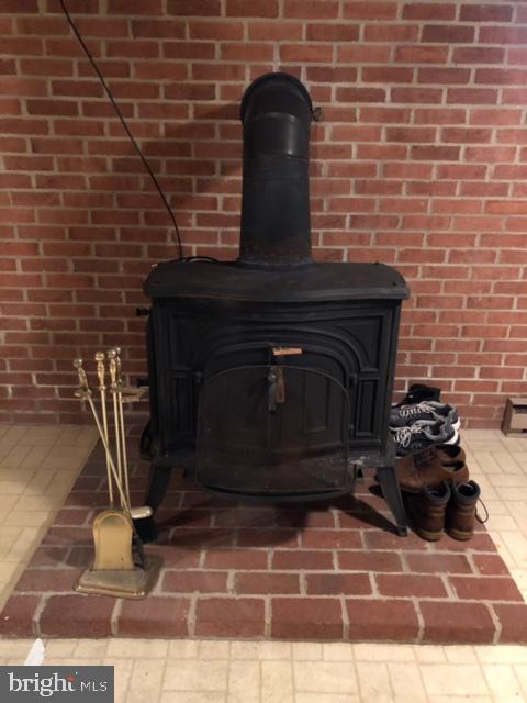 117 East 4th Avenue Ranson, WV 25438 - Photo 61 of 70 Woodstove in finished basement