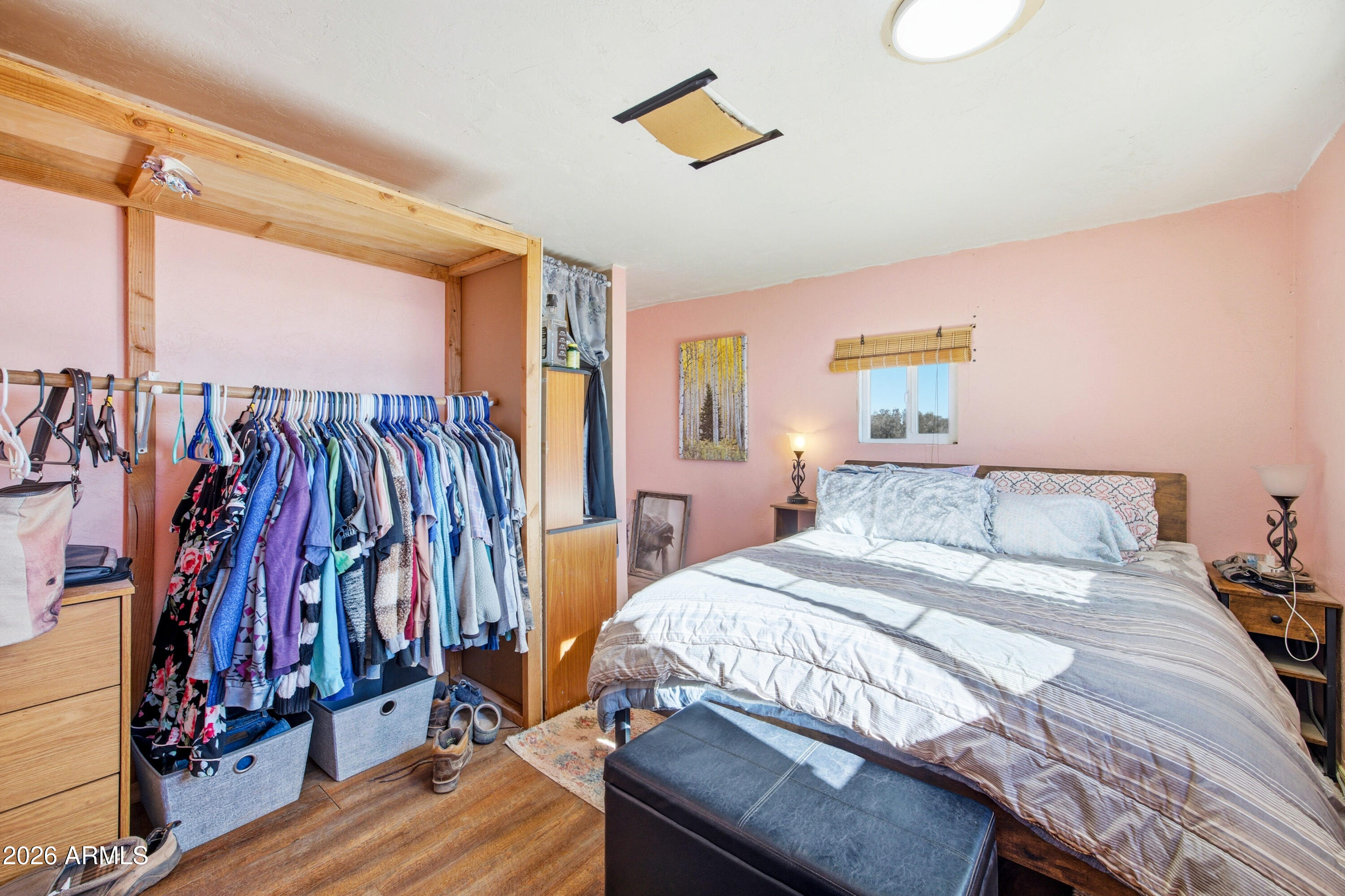 4394 Keats Road, Unit 52 Snowflake, AZ 85937 - Photo 15 of 33 a bedroom with a bed and a walk in closet
