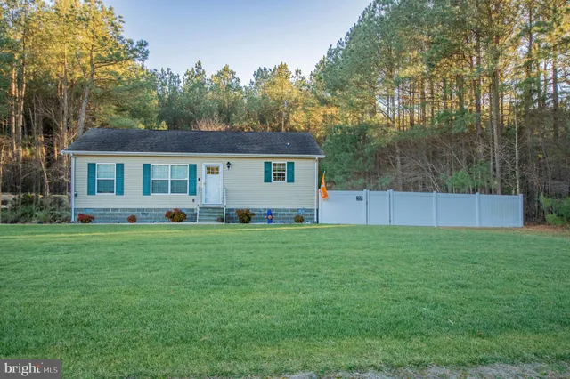 a house view with a garden space